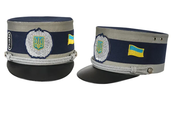 Policejní čepice, proti Bílému pozadí ukrajinský policista — Stock fotografie