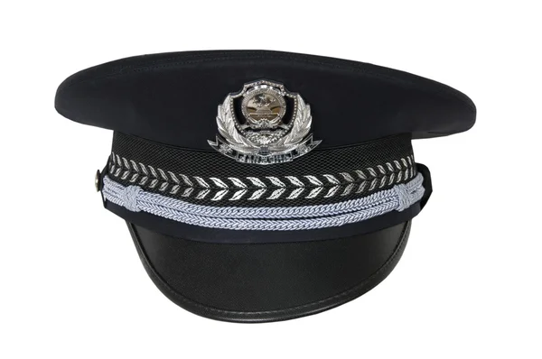 Sombrero de policía, sobre fondo blanco. Oficial de policía de China Imagen de archivo