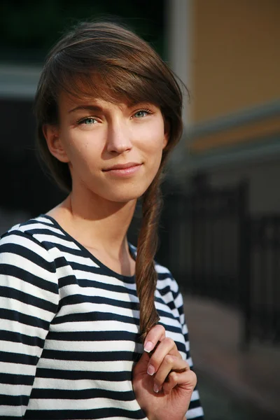 Pretty young girl in frock — Stock Photo, Image