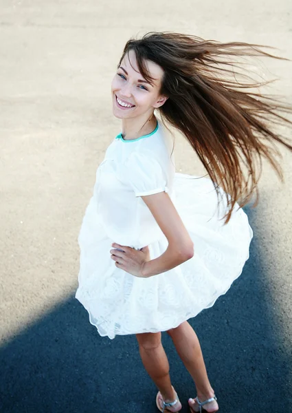 Young lady in white dress — Stock Photo, Image