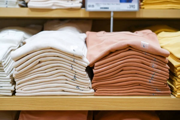 Pile Shirts Earth Tone Color Cream Brown Folded Put Shelf —  Fotos de Stock