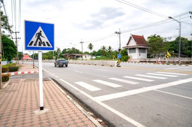 Zebra cross sign beside the road at Thailand.