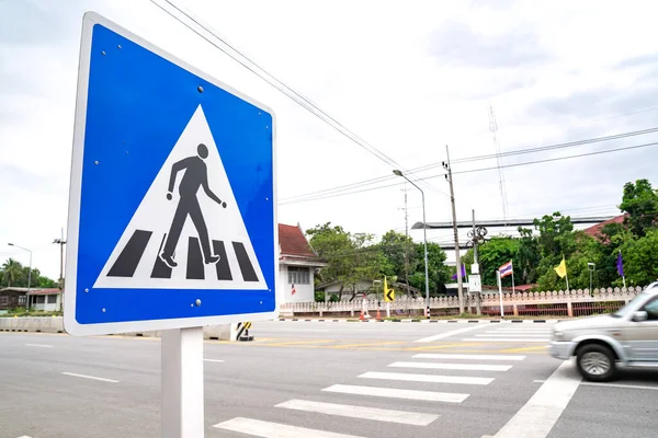 Zebra cross sign beside the road at Thailand.