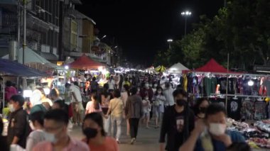 Nakhon Phanom, Thailand - 23 Oct 2021, Environment of people walked and shopped around Night Walking Street Market at Nakhon Phanom., Thailand.