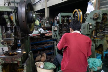 Machine and tool of Computer numerical control CNC, factory creates metal religion art such as Gold rolling machine and little jewelry in religious ceremony.