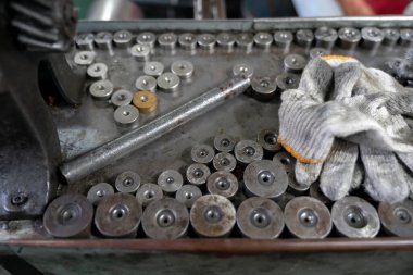 Machine and tool of Computer numerical control CNC, factory creates metal religion art such as Gold rolling machine and little jewelry in religious ceremony.