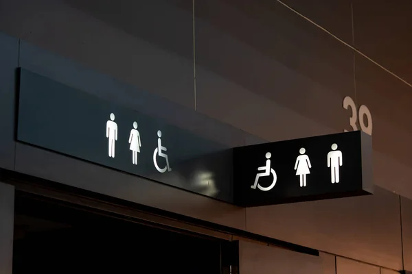 Siyah Bir Tabaktan Çıkan Beyaz Bir Tuvalet Aydınlanmasının Işareti Tuvalet Stok Fotoğraf