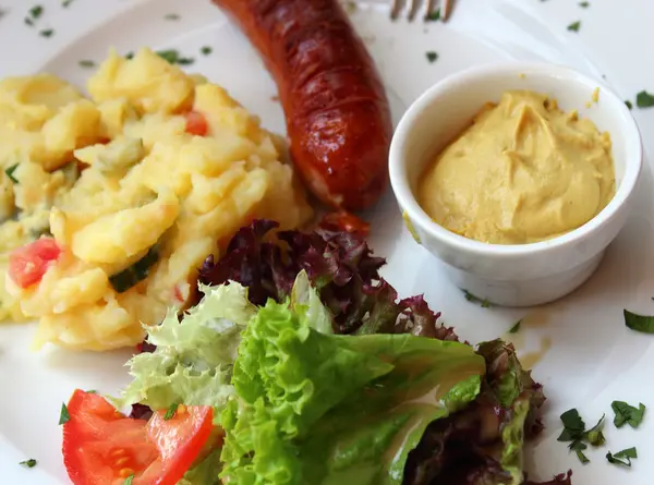 Sausage with mustard — Stock Photo, Image