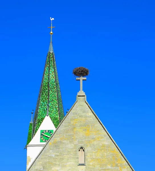 Church tower and stork nest — Stock Photo, Image