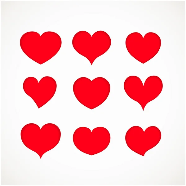 Set of grunge vector hearts — Stock Vector