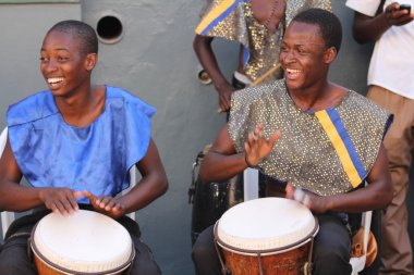 Jamaican Street Performers Playing Bongo Drums clipart
