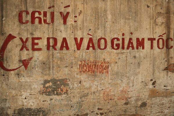 Textured Grunge Wall Background with Graffiti