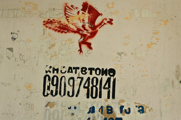 Textured Grunge Wall Background with Graffiti