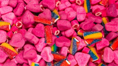 Lezzetli jelibon şekerler. Üst Manzara. Pembe jöleli şeker arka planı. 