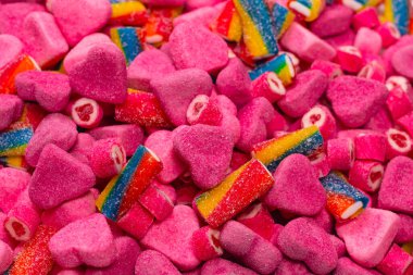 Lezzetli jelibon şekerler. Üst Manzara. Pembe jöleli şeker arka planı. 