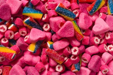 Lezzetli jelibon şekerler. Üst Manzara. Pembe jöleli şeker arka planı. 
