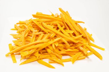 Arka plan olarak kuru, lezzetli mango dilimleri. Üst görünüm. 