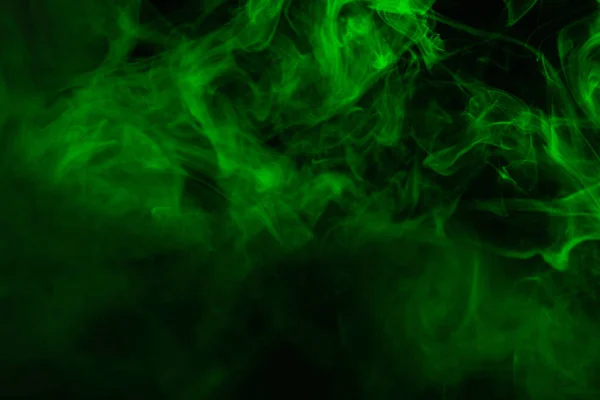 Premium Photo Blue steam on a black background. copy space.