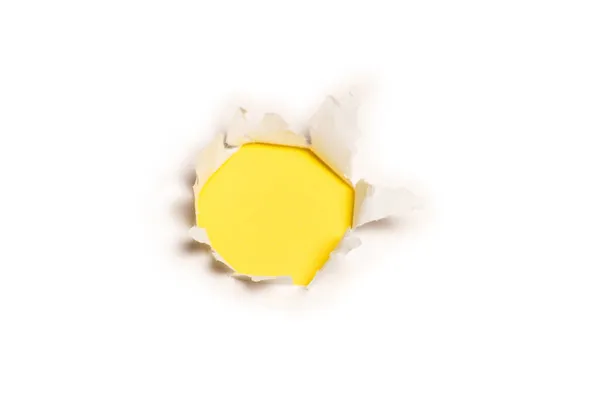 Ein Loch Einem Weißen Papier Auf Gelbem Hintergrund Kopierraum — Stockfoto