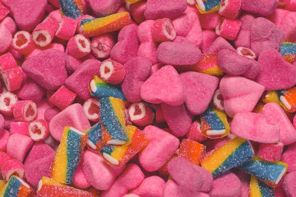 Verschiedene Leckere Gummibärchen Ansicht Von Oben Rosa Gelee Bonbons Hintergrund — Stockfoto