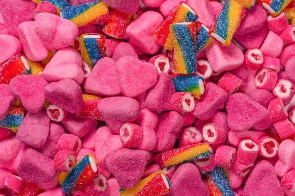 Lezzetli jelibon şekerler. Üst Manzara. Pembe jöleli şeker arka planı. 