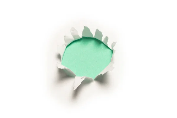 Dziura Białej Księdze Zielonym Tle Przestrzeń Kopiowania — Zdjęcie stockowe