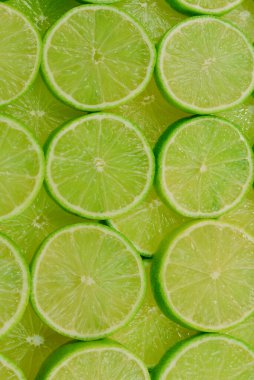 Arkaplan olarak taze limon dilimleri. 