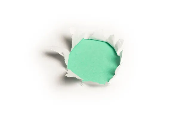 Dziura Białej Księdze Zielonym Tle Przestrzeń Kopiowania — Zdjęcie stockowe