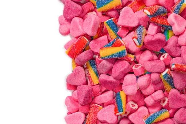 Geassorteerde Smakelijke Gummisnoepjes Bovenaanzicht Roze Gelei Snoepjes Achtergrond — Stockfoto