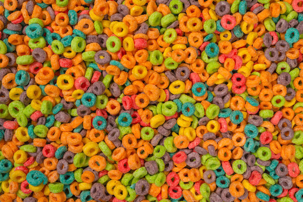 Сладкие разноцветные хлопья, хлопья в качестве фона.. 