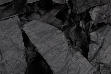 Soyut siyah kağıt dokusu arkaplanı. Üst Manzara. Boşluğu kopyala. 