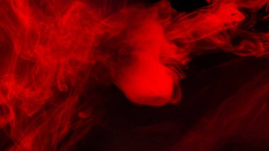 Siyah arka planda kırmızı buhar. Boşluğu kopyala.
