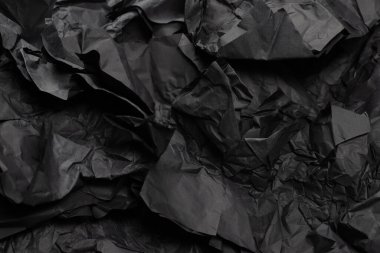 Soyut siyah kağıt dokusu arkaplanı. Üst Manzara. Boşluğu kopyala. 