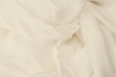 Yumuşak beyaz ipek kumaş arka plan. Kumaş dokusu. 