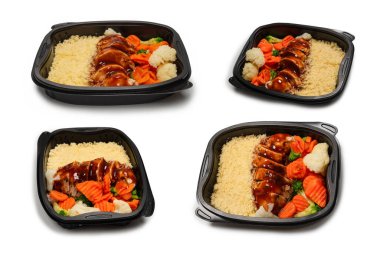 Konteynırda yemek hazır. Teriyaki soslu haşlanmış tavuk, haşlanmış havuç, lahana ve yulaf lapası. Beyaz bir arkaplanda izole edilmiş. 