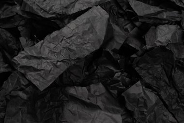 Soyut siyah kağıt dokusu arkaplanı. Üst Manzara. Boşluğu kopyala. 