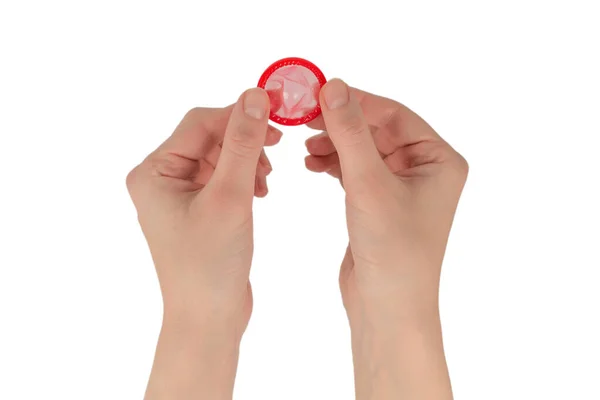 Beyaz Arka Planda Elle Izole Edilmiş Kadın Prezervatifi — Stok fotoğraf