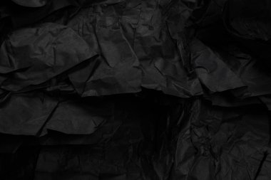 Soyut siyah kağıt dokusu arkaplanı. Üst Manzara. Boşluğu kopyala. 