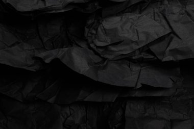 Soyut siyah kağıt dokusu arkaplanı. Üst Manzara. Boşluğu kopyala. 