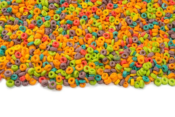 Sweet multicolored flakes, cereal loops as a background..