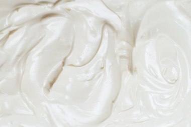 Beyaz krem şanti dokusu. Üst görünüm. 