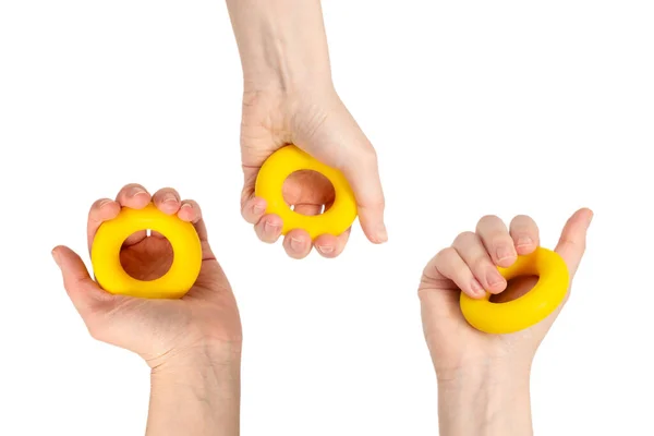 女性の手に黄色とオレンジの拡大白の背景に隔離された トップ表示 — ストック写真