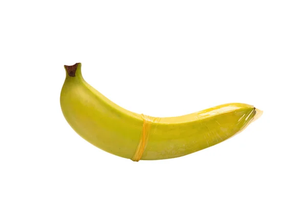 Uma Banana Com Preservativo Isolado Sobre Fundo Branco — Fotografia de Stock