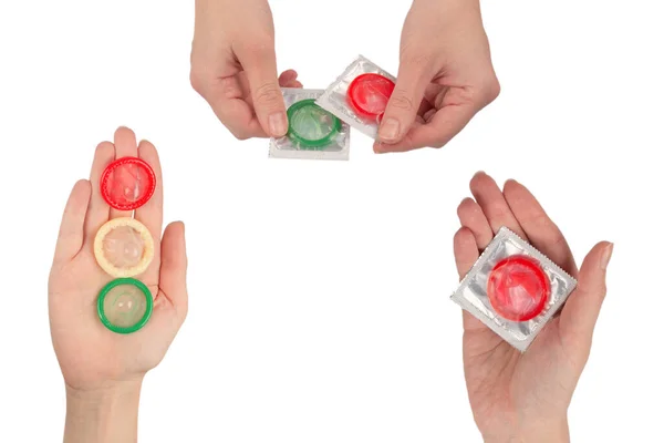 Beyaz Arka Planda Elle Izole Edilmiş Kadın Prezervatifi — Stok fotoğraf