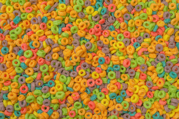 Сладкие разноцветные хлопья, хлопья в качестве фона.. 