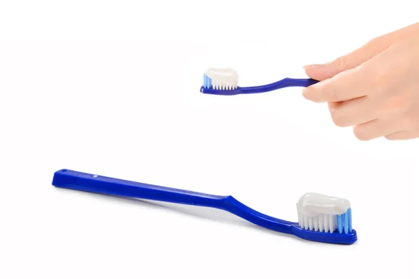 Blue Toothbrush Toothpaste Her Hand Isolated White Background Copy Space — Stock Photo, Image