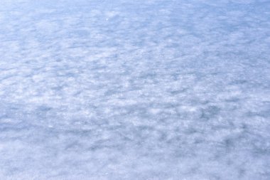 Buzun doğal dokusu, arka plan olarak donmuş göl..