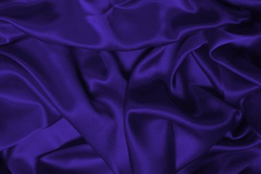 Zengin ve lüks kırmızı ipek kumaş dokusu. Üst görünüm.