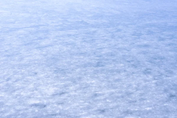 Buzun doğal dokusu, arka plan olarak donmuş göl..