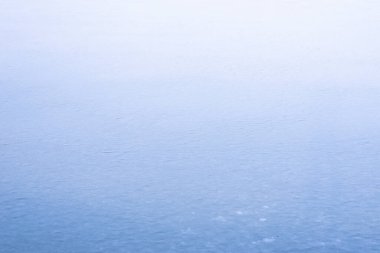 Buzun doğal dokusu, arka plan olarak donmuş göl..